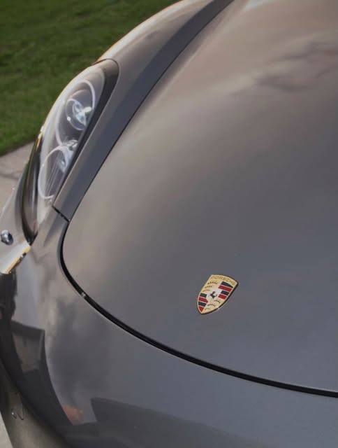 Detailed Porsche hood with a refined paint finish